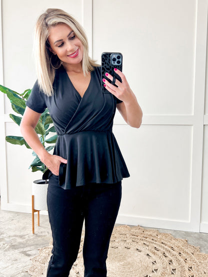 Peplum Surplice Top In Black